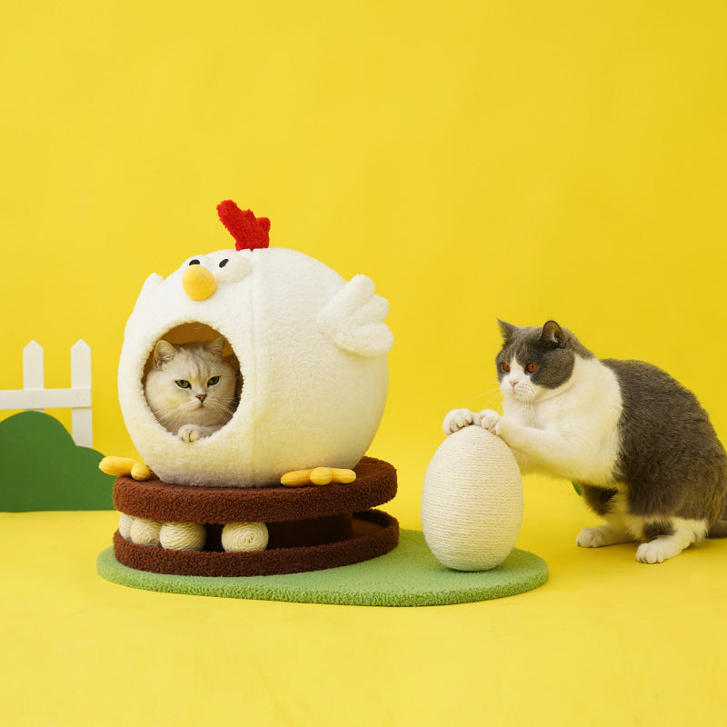 Cat playing with a chicken-shaped pet bed on a yellow background