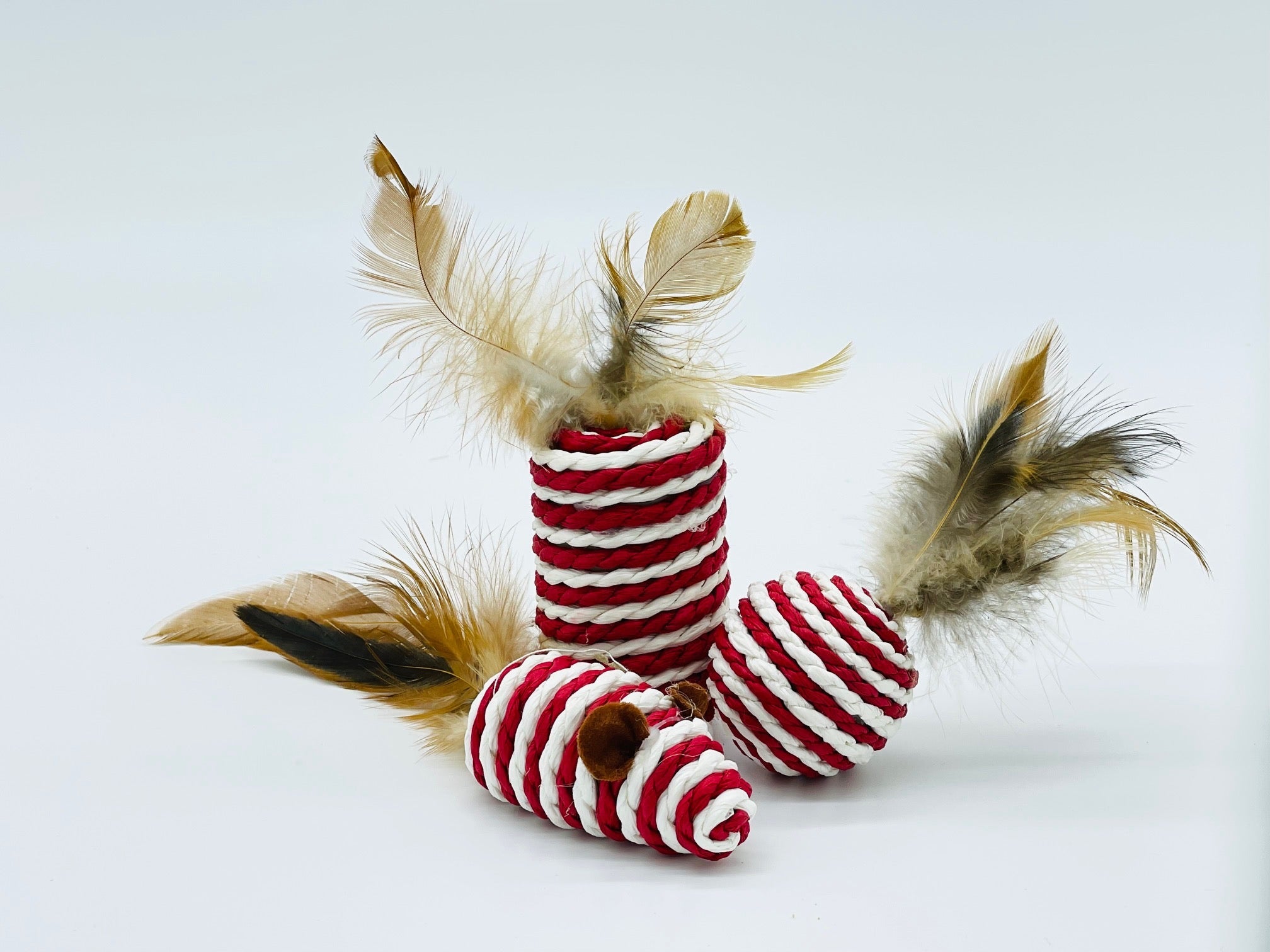 MR Toulouse Pet Shop Red and white striped cat toys with feathers on a light grey background
