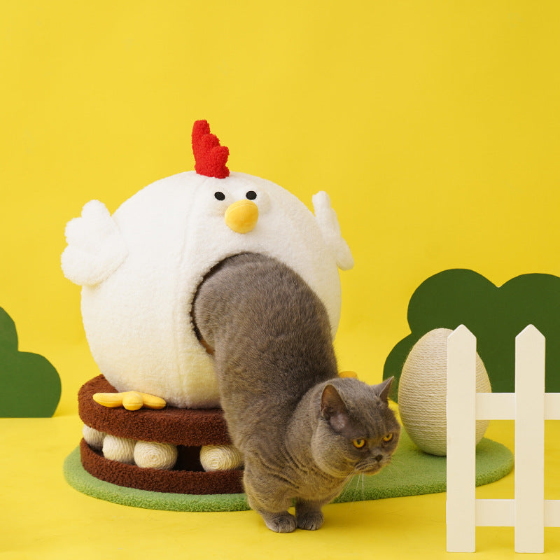 Cat interacting with a chicken-shaped toy on a yellow background