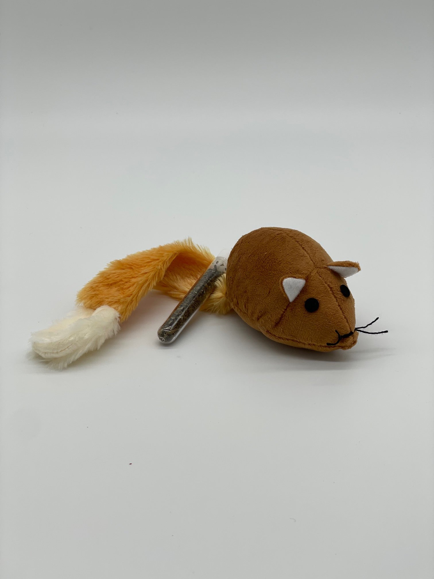 Plush squirrel toy with a metal clip on a white background