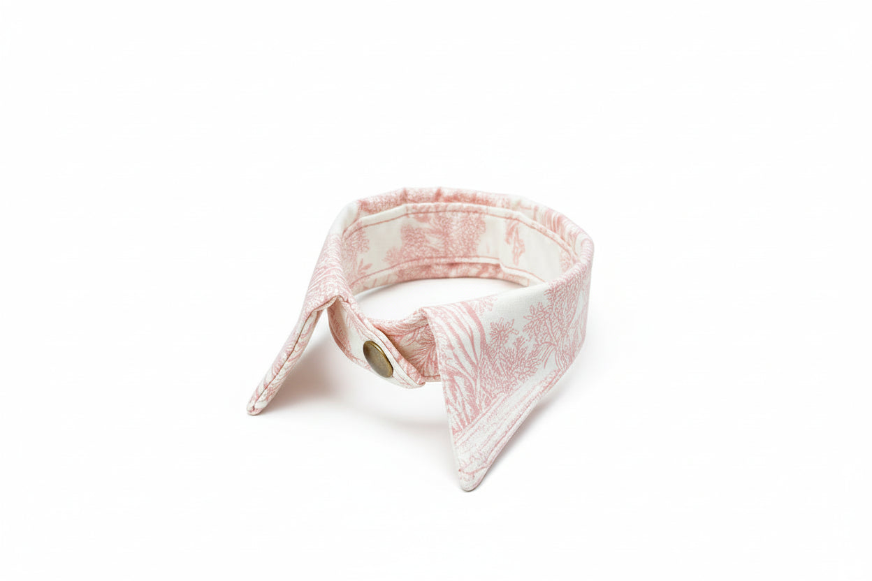 Fabric collar on a textured surface with natural background