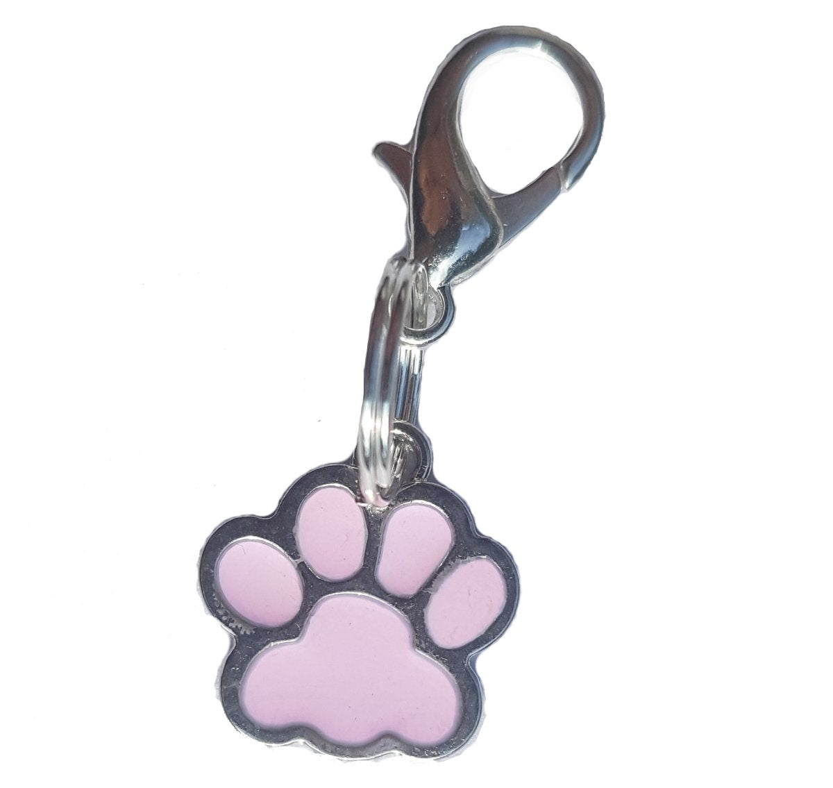Pink paw print charm with a metal clip on a white background
